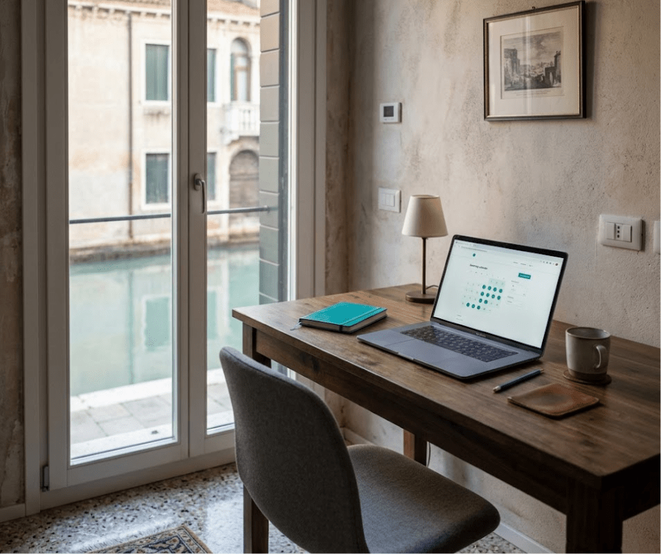 Laptop showing a booking calendar on a desk in a Venetian apartment overlooking a canal — Airbnb rate discipline vs occupancy chasing, AQ Digital